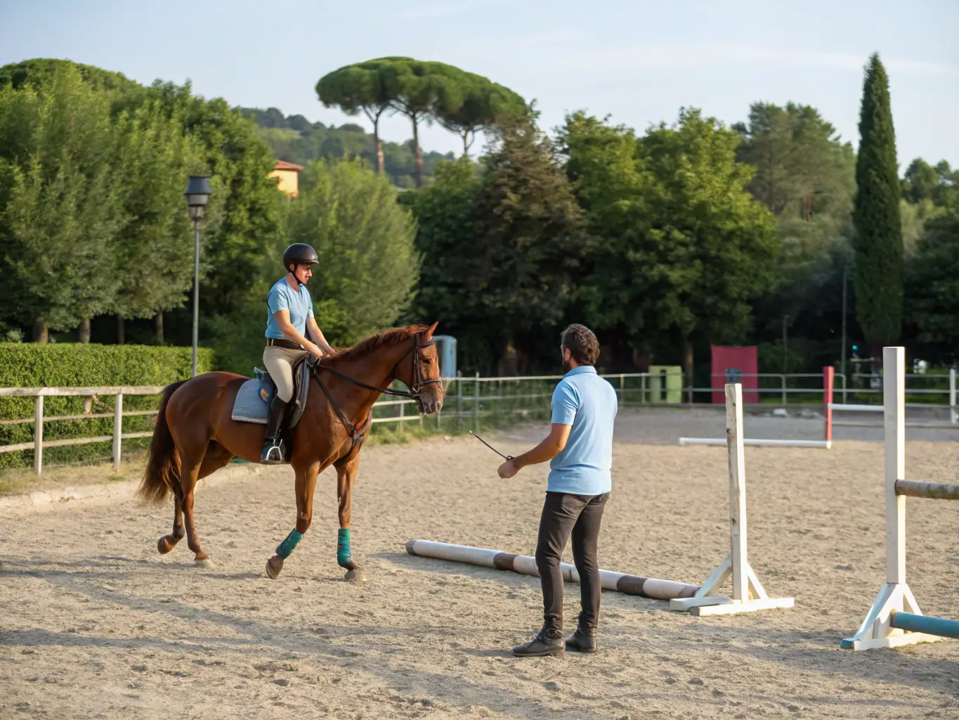 A group of riders participating in a training session, receiving guidance from an experienced instructor.